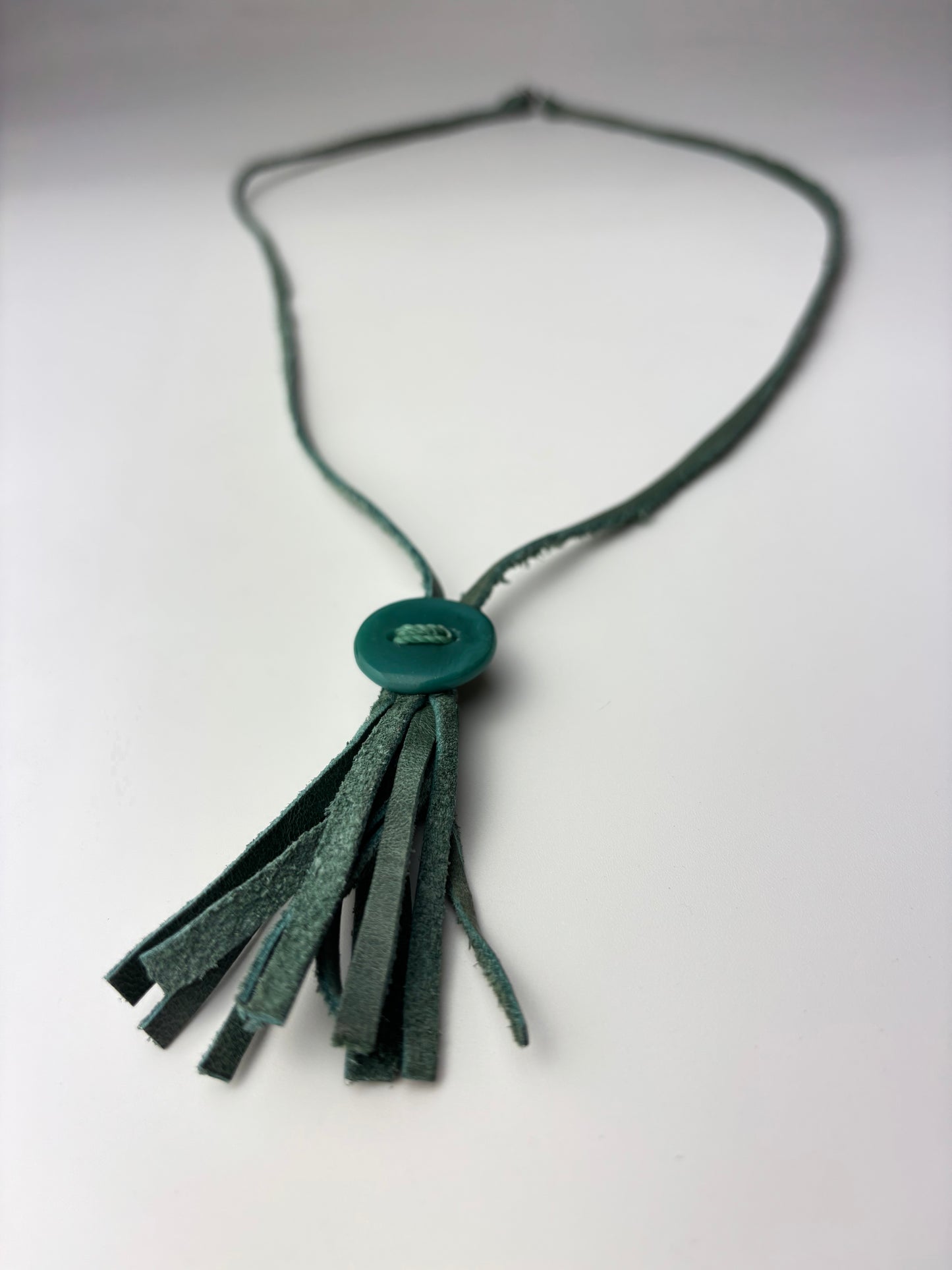 Fringe with glass button necklace