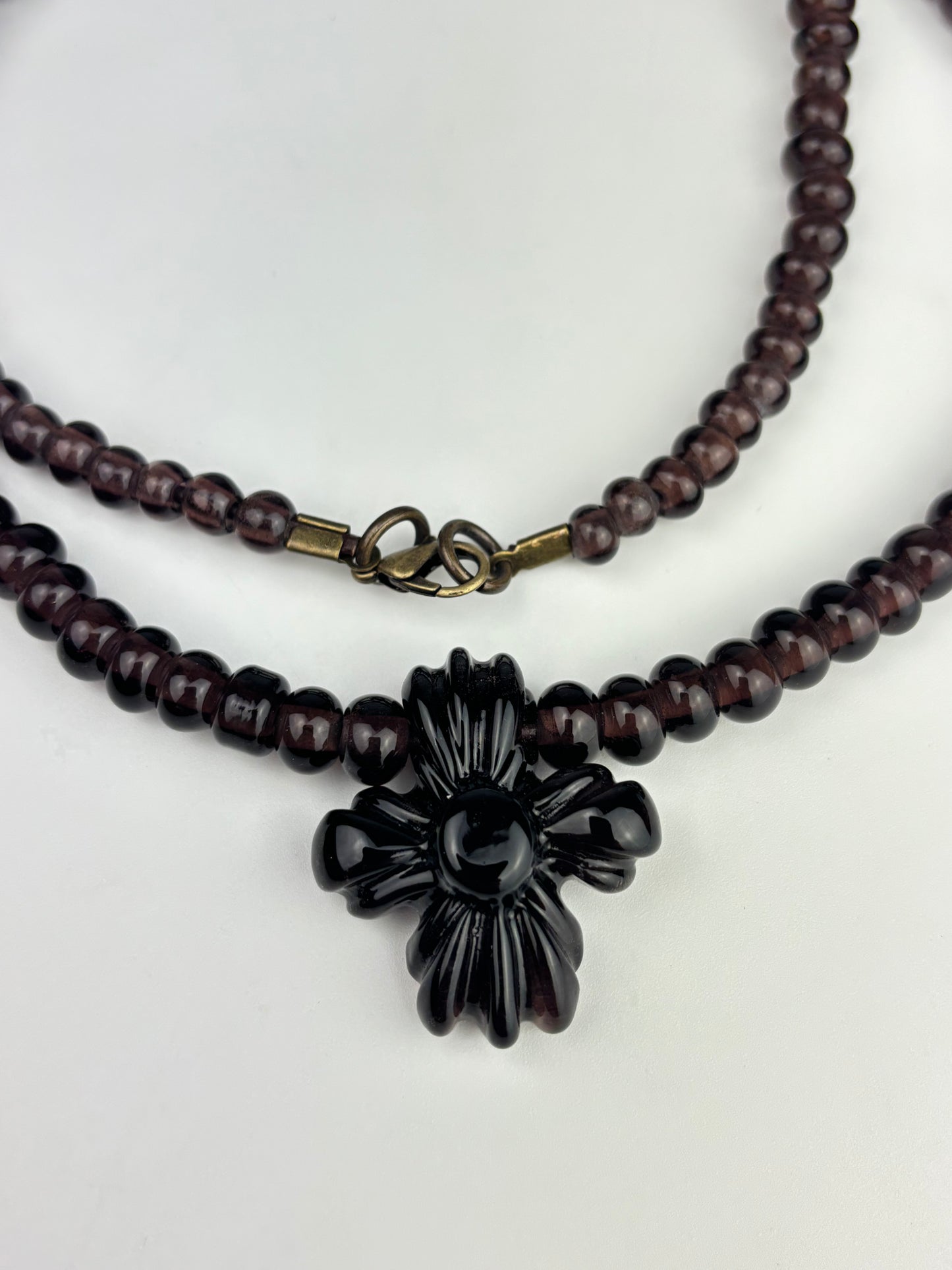Coldworked Doom necklace in Plum glass