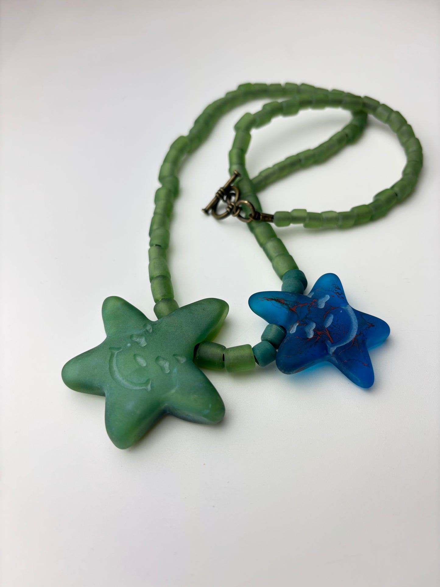 ASS PIZZA Star logo necklace