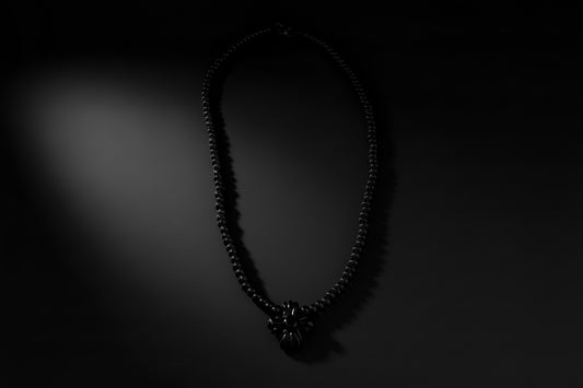 Coldworked Doom necklace in Plum glass