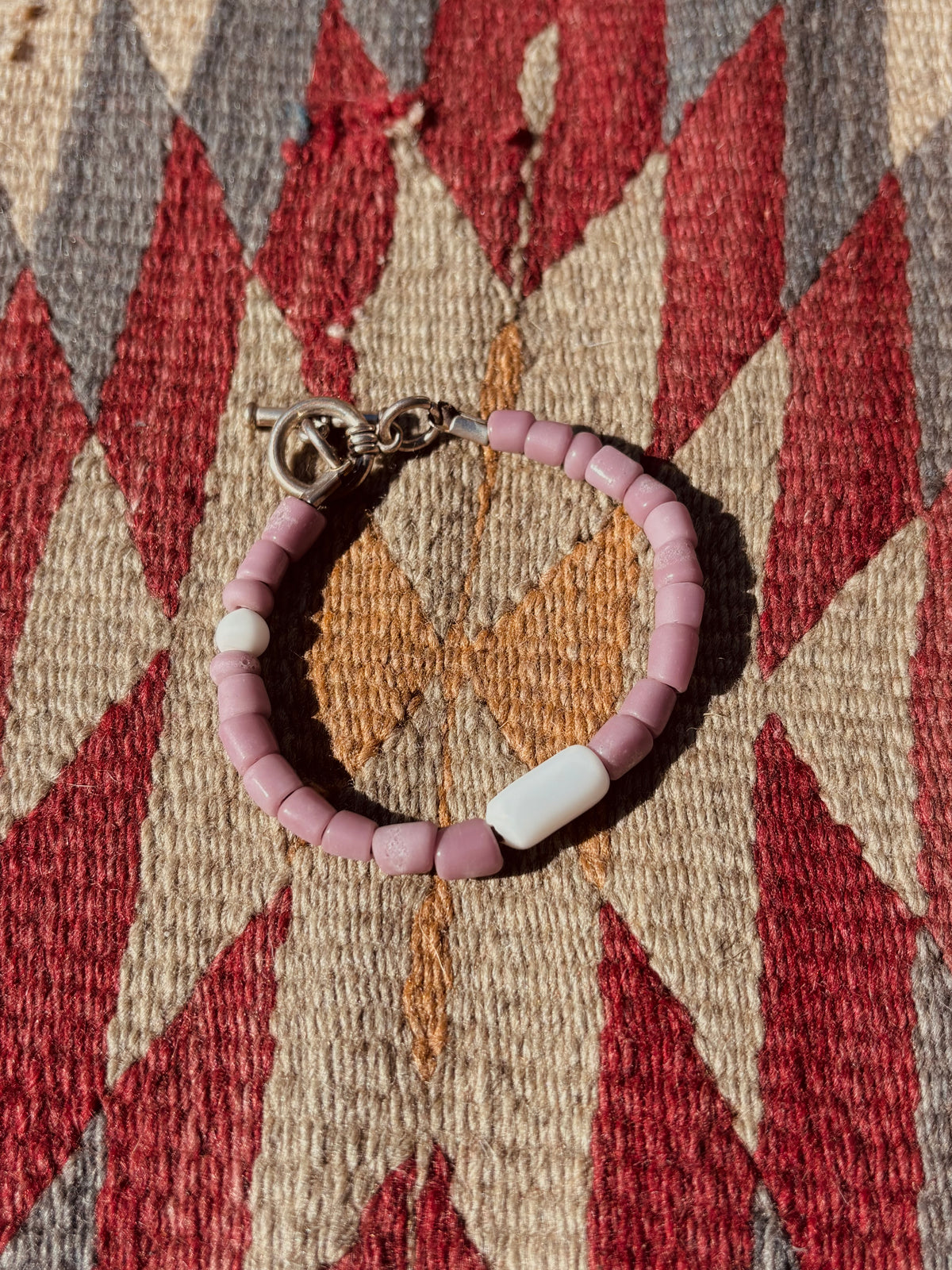 Sand blasted beaded bracelet in mauve